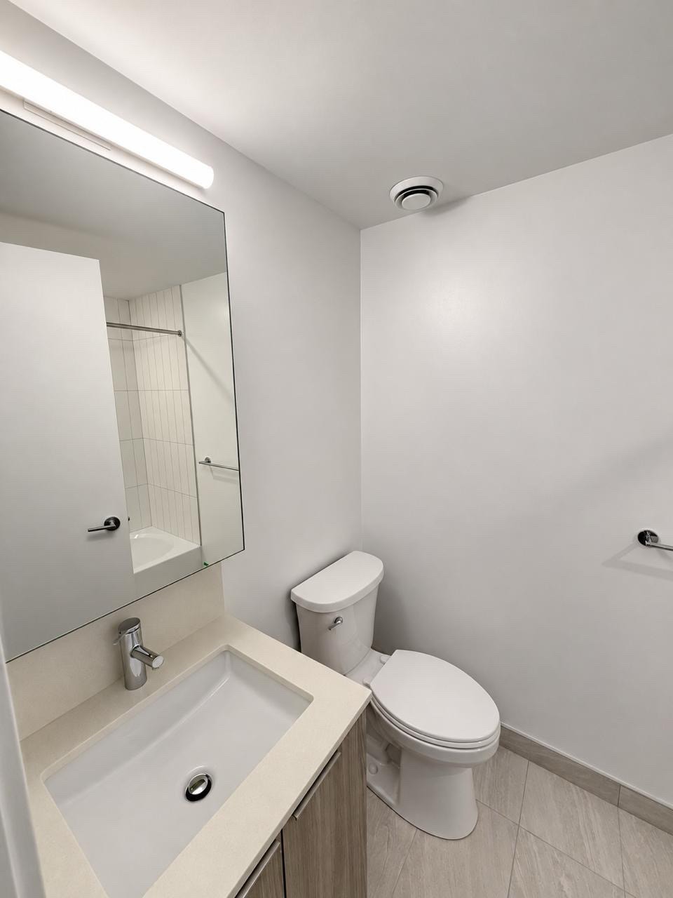 Brand New 1 Bed + Den Condo at Metro Park 2
