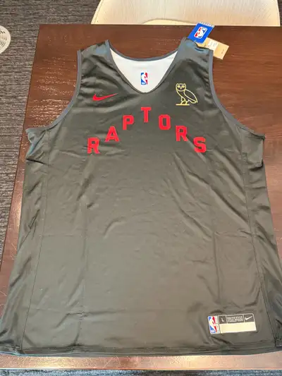 Brand new with tags on Size large Reversible authentic Toronto raptors ovo PRACTICE jersey