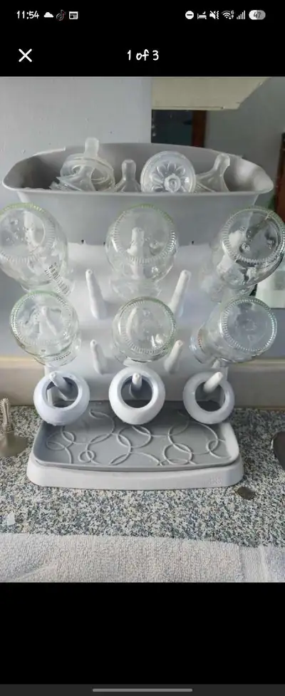 6 glass Avent-9oz bottles,bottle drying rack,3 silic.sleeves, View more