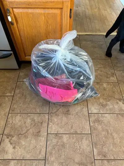 Bag of assorted Woman’s and Men’s clothing, View more