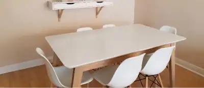 The table is solid, like new, no scratch. 6 chairs included.