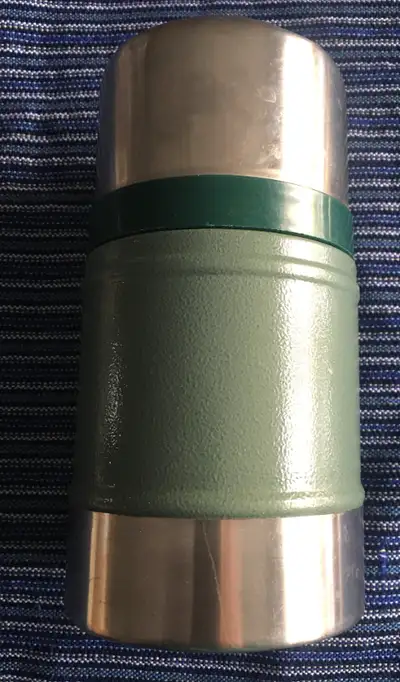 rarely used, lid closes tight, 7 in high, base diameter 4 inch keeps food hot or cold for 7 hours