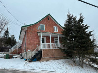 Duplex tout brique avec une vue superbe sur la ville