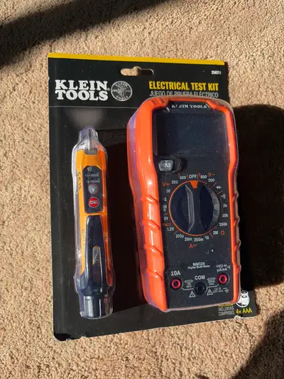 This brand new Klein Tools Electrical Test Kit, model 25KIT1, includes a digital multimeter and a no...