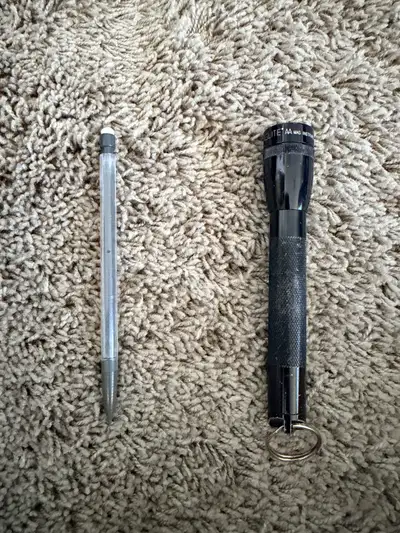 This is your classic Mini MagLite flashlight, still working well.