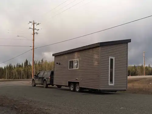 **Available end of July 2025 or by arrangement** This custom-built 20x8x13.6 ft road-legal tiny home...