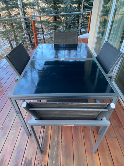 GLUCKSTEIN PATIO TABLE AND CHAIRS, View more