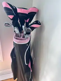 woman golf clubs with bag
