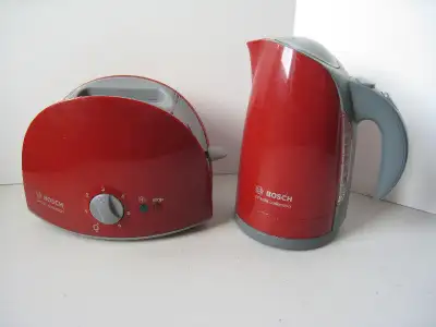Kettle and toaster from the Klein collection. Look just like the real things. Very good condition.