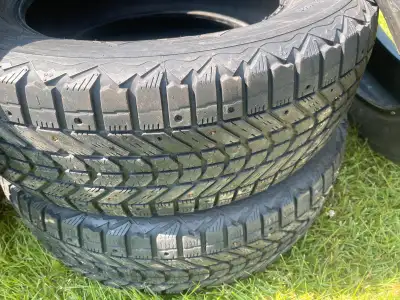 Selling 4 17 inch studded snow tires Firestone directional