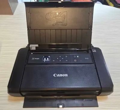 Canon PIXMA TR150 Wireless Portable Printer (w/ Battery Pack), View more