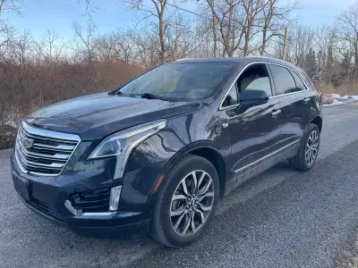 2019 Cadillac XT5 103km awd, auto, heated seats Power lift gate, auto start Car has front end damage...