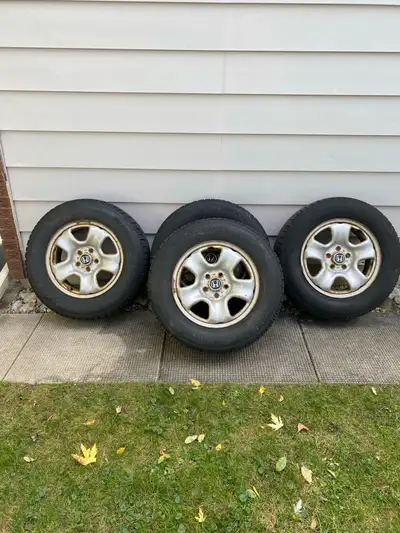 4 Snow Tires BF Goodrich Winter Slalom KSI P215/70 R16 Two tires at 6 mm , one at 5 mm , one at 4 mm...