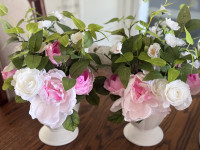 Artificial flowers in white vases