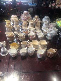 Huge collection of creamers and sugar bowls 