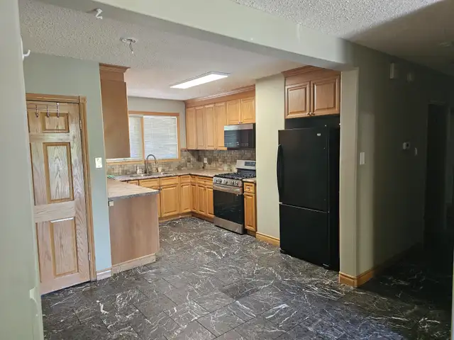 Separate Heat for each suite, 3 bdrm, 1.5 ba, parking, Haultain