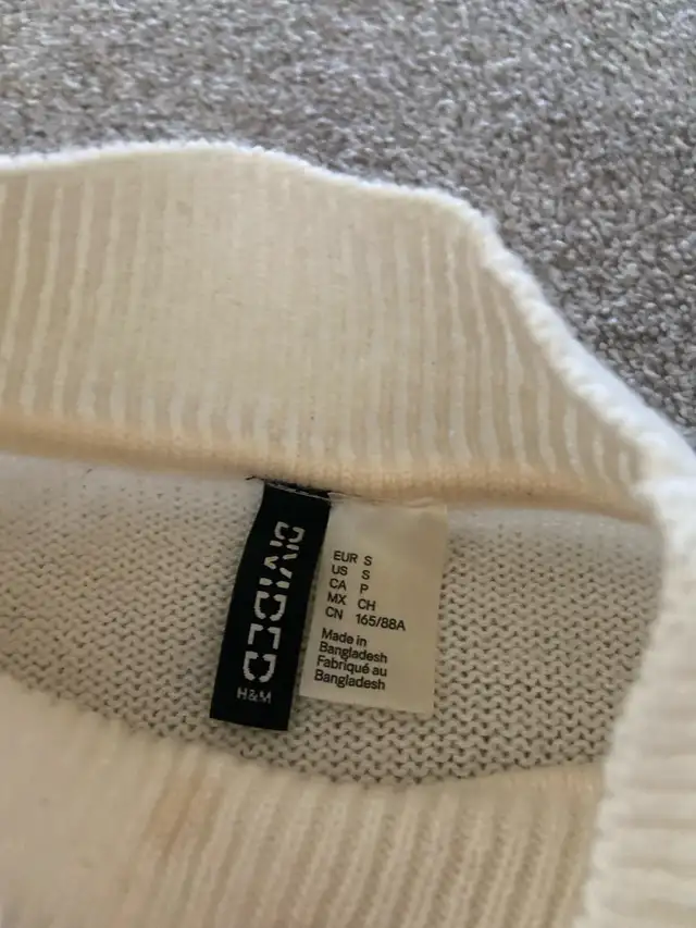 divided sweater 62863286059267121