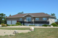 Country Living Bordering Town of Assiniboia