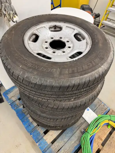 ** SELLING ON BEHALF OF MY EMPLOYER ** We are selling a set of four (4) wheels and tires from our 20...