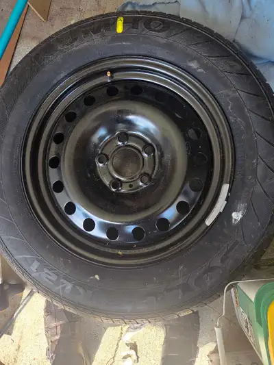 New tire and rim 245x65x 18 balanced never used i believe dodge truck rim ? Please contact for pk up...