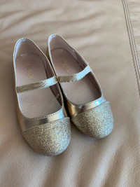 Child’s gold shoes