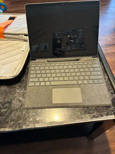 Windows surface pro 10 With pro keyboard and pen, View more
