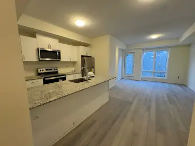 Tapscott Rd. 1.5 Year old. Welcome to this bright and modern 2-bedroom, 1-bath condo townhome locate...