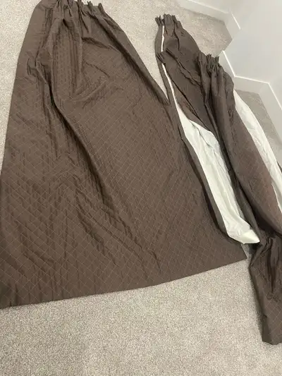 Selling 4 set of dark brown curtains $50 each and 1 shower or window curtain $100. Sun blockers. The...