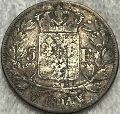 Offered here is an authentic 1824-W France 5 Francs silver coin featuring King Louis XVIII and struc...
