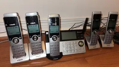 Vtech phone answering machine with 4 handsets, View more