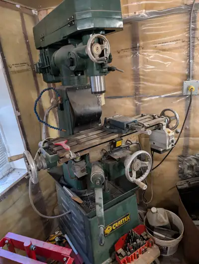 Craftex vertical milling machine in really good shape. Has an auto feed table and multiple vices for...
