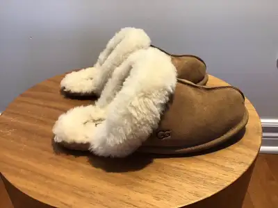 These slippers are in good condition. They are suede on outside and sheepskin on the inside. They ar...