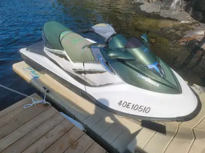 Green 2002 Seadoo GTX Di 951 with trailer all in perfect functioning condition. Seadoo has 318 hours...