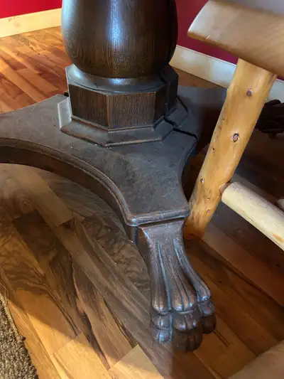 Tiger Oak Round Dining table 52” plus 3- 11” leaves total 85” x 52” when all leaves are installed. G...