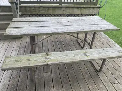 For sale picnic table easy to get in and out of metal frame solid still has lots life in it left 75....