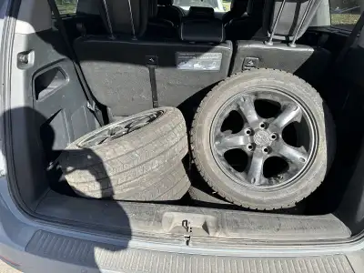 Selling a full set of winter tires with black alloy rims, suitable for cars that use 16–17 inch tire...