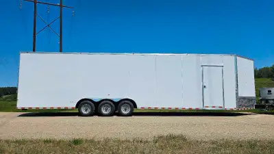 Brand New 2025 8.5x32 plus 5' V-nose, 37' inside length, 15,600 lbs GVW Cargo Trailer. It has 3-5200...