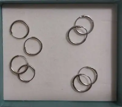 These genuine Sterling silver hoop earrings are perfect for everyday wear. They're lightweight, and...