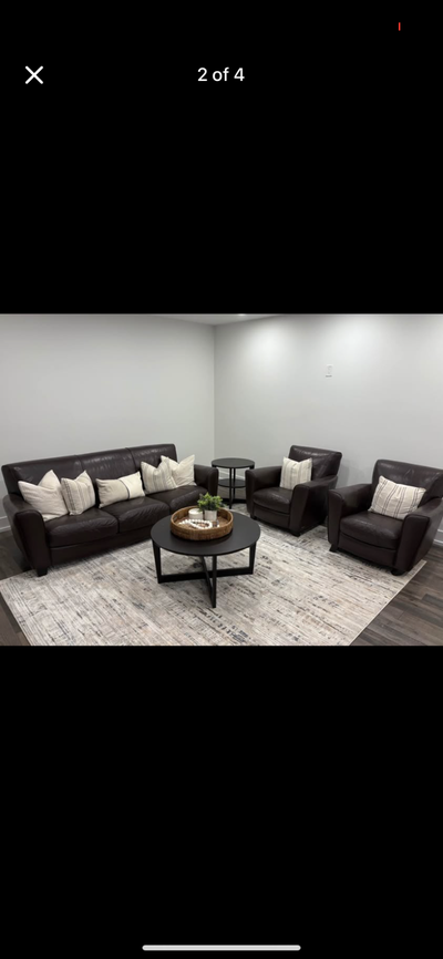 Natuzzi leather couch and two leather matching chairs, View more