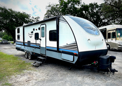 For sale, a very well maintained 2018 Forrest River Surveyor 295, on a lot at Pine Lake, part of Par...