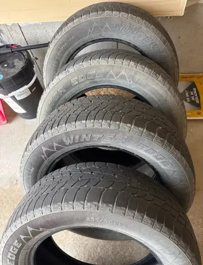 Set of 4 winter tires asking only $300 if interested please contact or best offer 235 /60 R/18 tires...