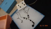Necklace  Pendant, black stones, delicate , earrings too, birks?