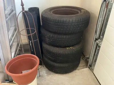 Four Michelin summer tires with rims. They are in good condition with lots of tread. Size: 215/70R15