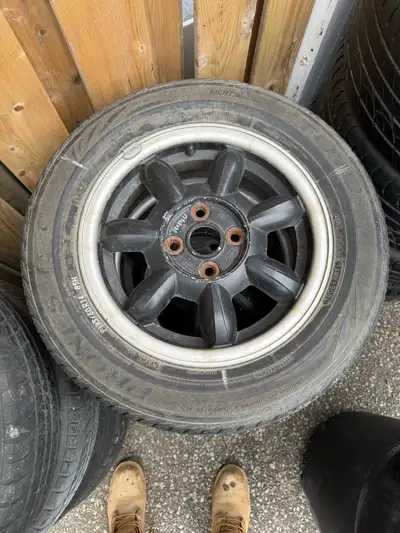 14” set of oem miata rims Tires are junk 195/60/r14
