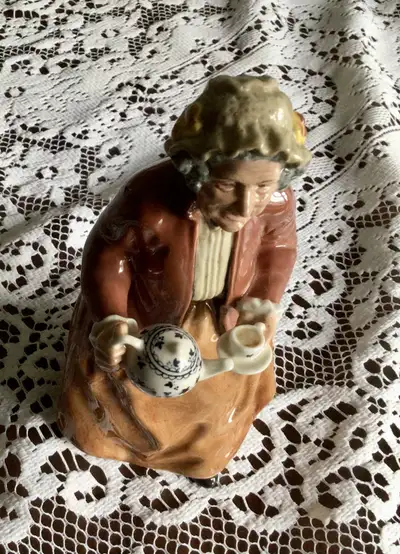Royal Dolton figurerine old lady, View more