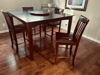 Pub table and 8 chairs 