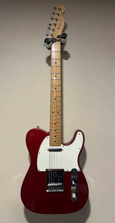 This 2016 Fender Telecaster Standard in a striking Candy Apple Red finish is in great, well-maintain...