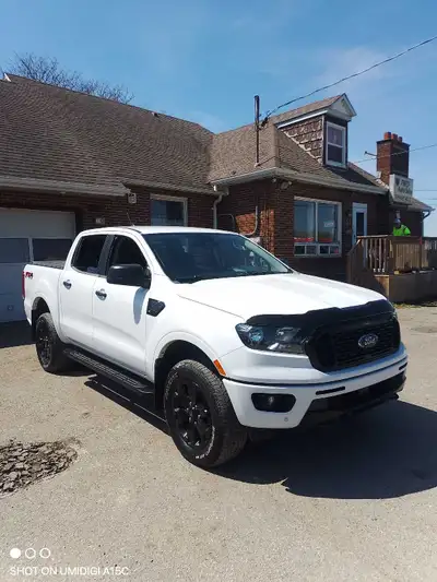 2020 Ford Ranger 4x4 White on Black interior Four cylinder engine great on gas Very well kept truck...