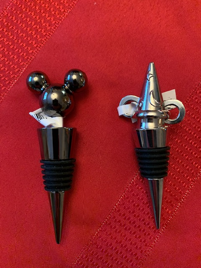 Walt Disney World Exclusive Mickey Mouse and Fantasia Wine Stoppers. These items both have original...