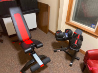 BowFlex heavy-duty bench and adjustable weight set with stand